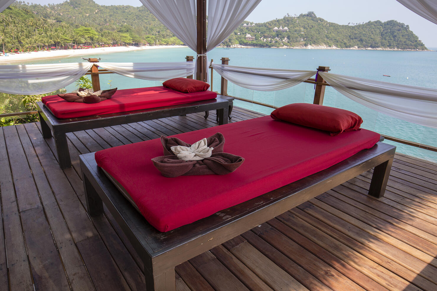 Massage table overlooking the sea. Spa massage room on the beach in Thailand