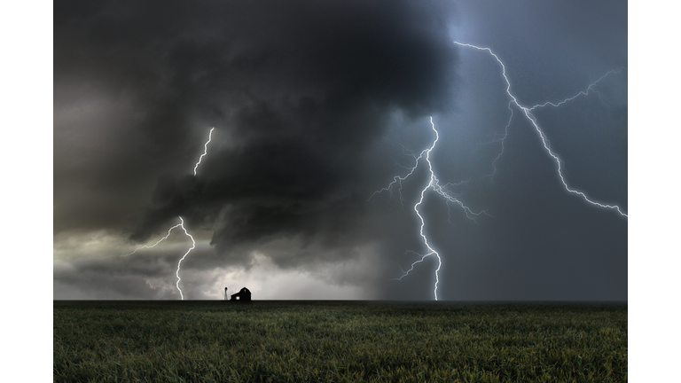 Lightning storm over a farm.