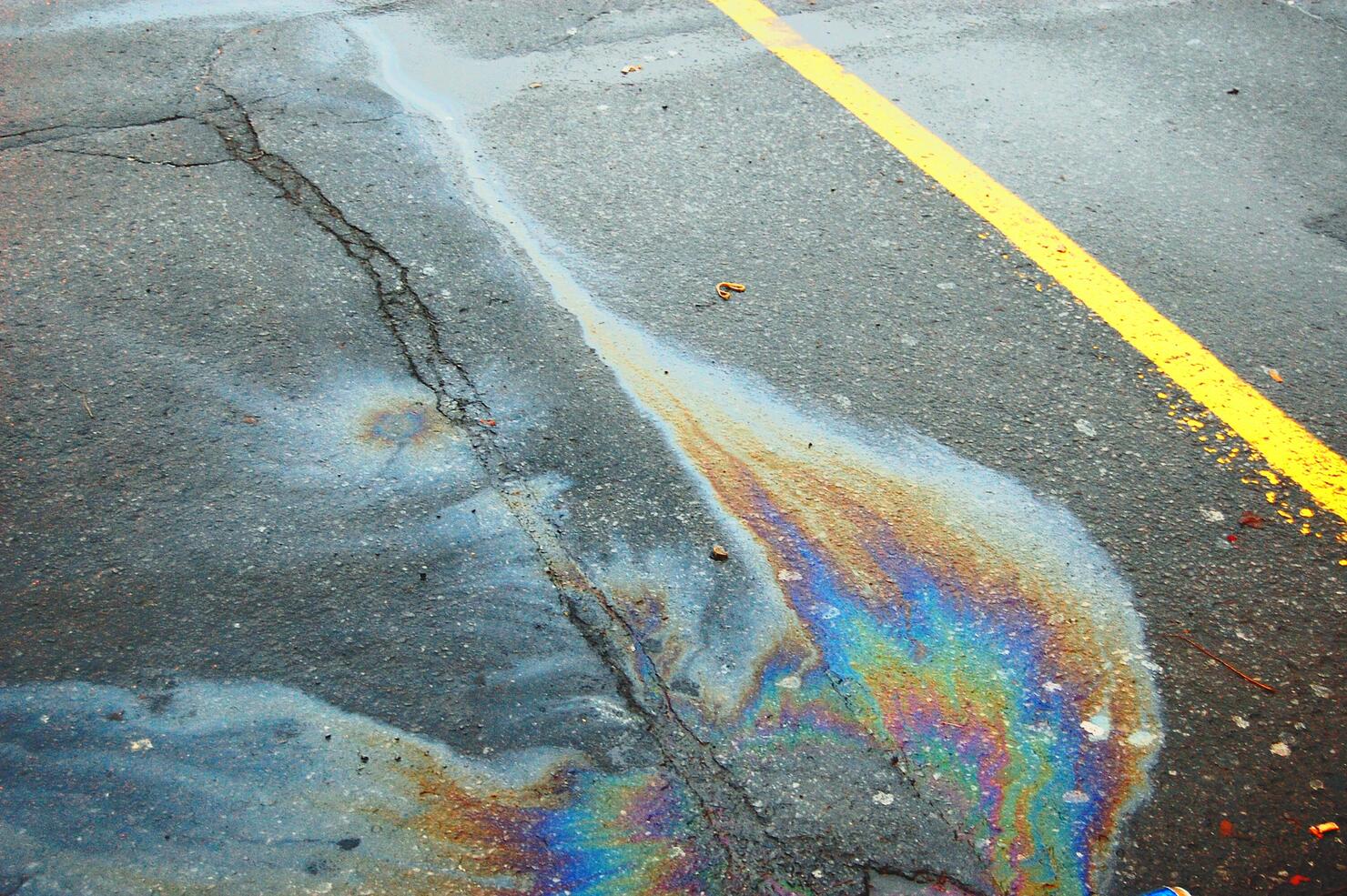 High Angle View Of Oil Spill On Road