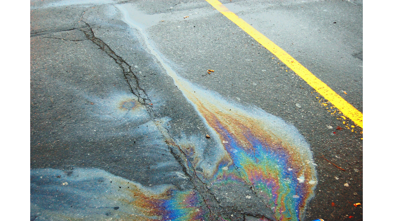 High Angle View Of Oil Spill On Road