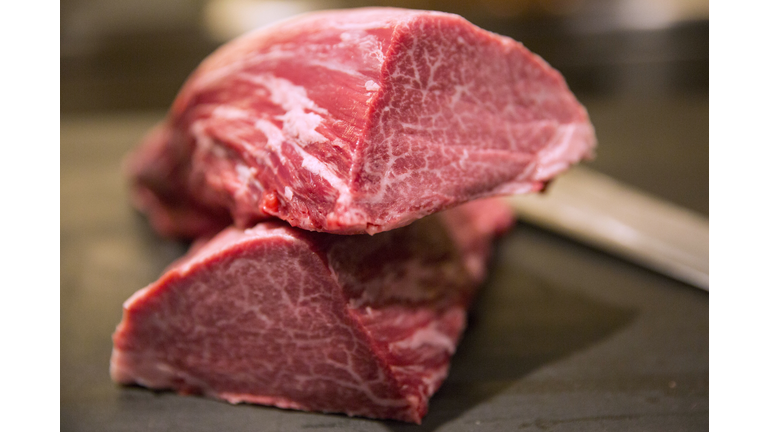 Pieces of Wagyu beef sits on a table at a members only restaurant