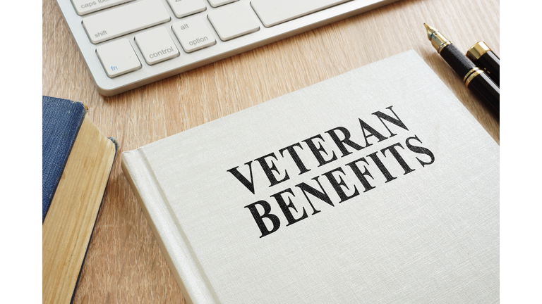 Book about Veteran Benefits on a desk.