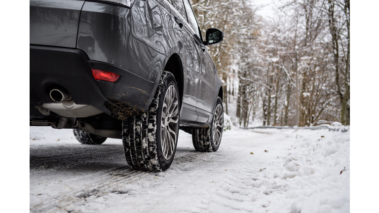 Close-up of winter car tires mounted on a sport utility vehicle