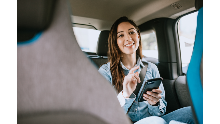 Woman In Car Rideshare In City of Los Angeles