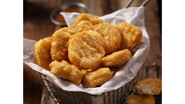 Basket of Chicken Nuggets with Sweet and Sour Sauce