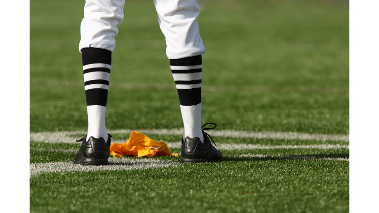 Referee Legs and Flag