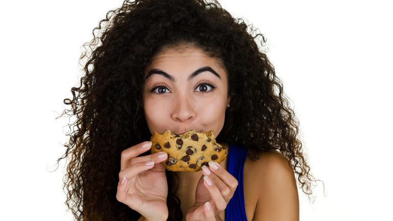 Girl eating a cookie