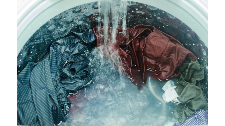 High Angle View Of Clothes Being Washed In Washing Machine