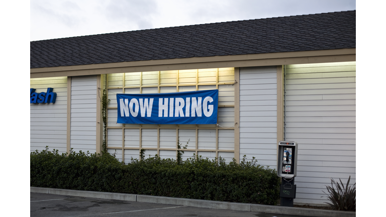 A NOW HIRING sign