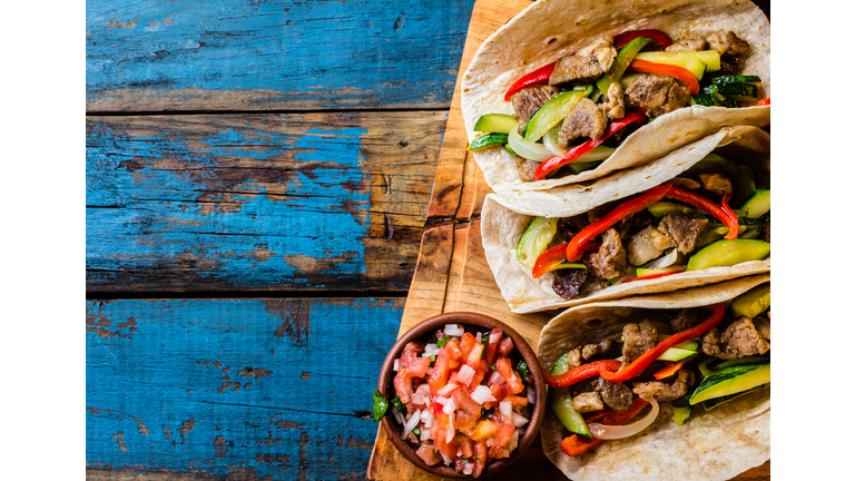 Mexican pork tacos with vegetables. Top view