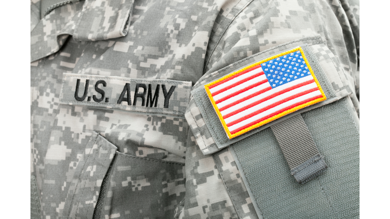 Close up studio shot of USA flag and U.S. ARMY patch on solders uniform