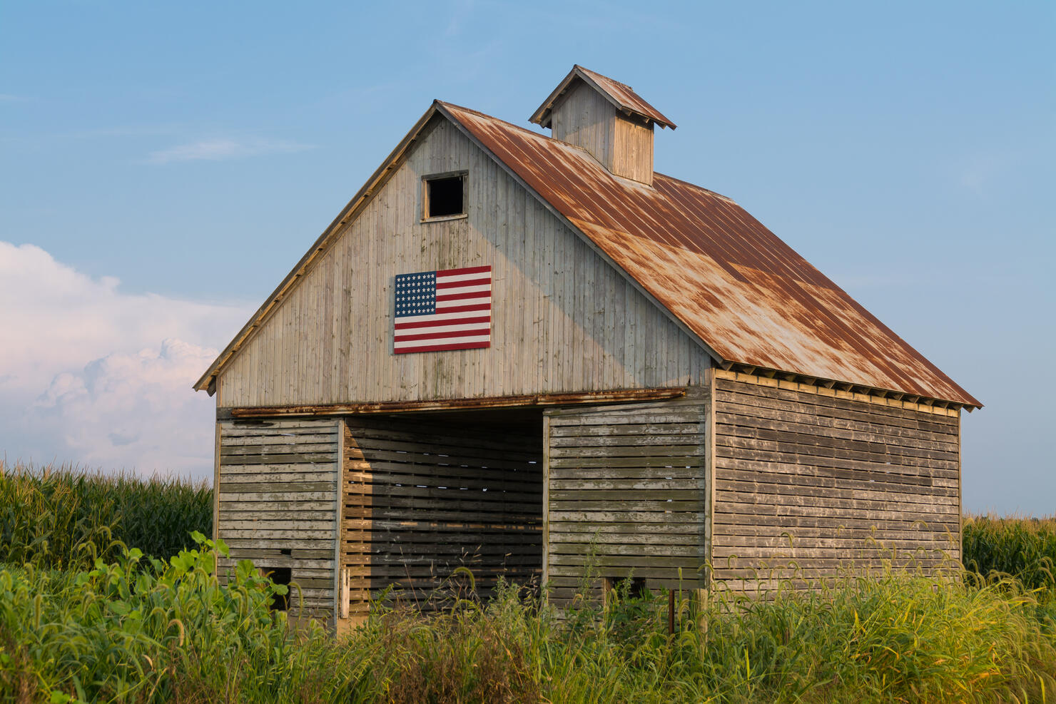 Rustic barn with American Flag