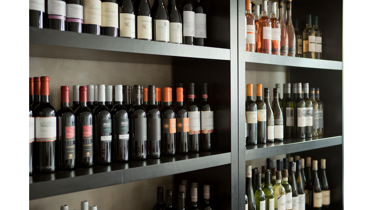 Wine bottles on shelves