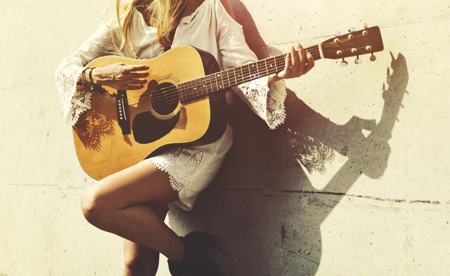 Girl Playing Guitar Writing Song Concept