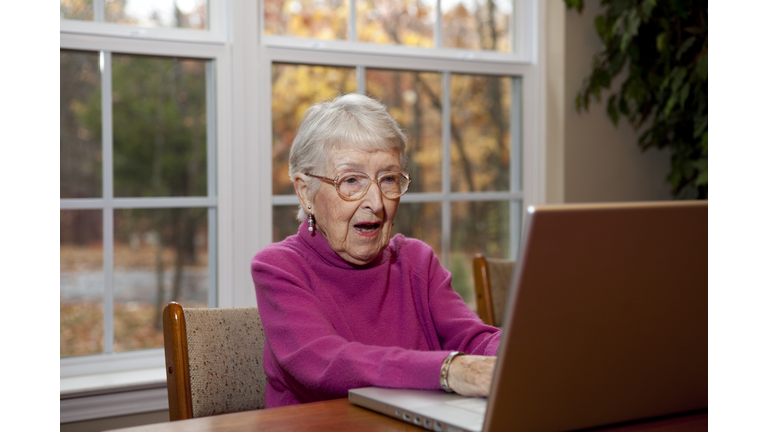 Surprised or Shocked Senior Woman, Grandmother at Computer
