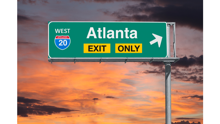 Atlanta Exit Only Freeway Sign with Sunrise Sky