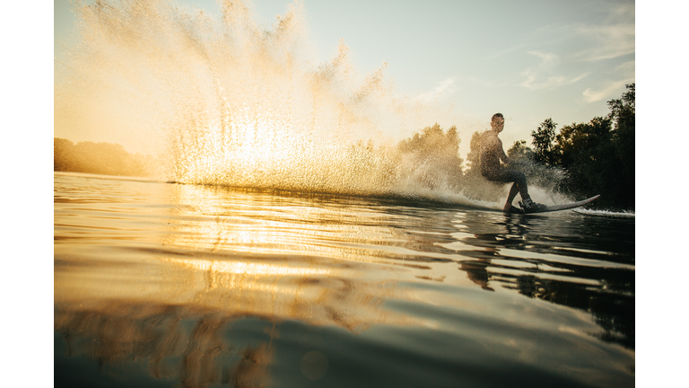 Man wakeboarding on a lake