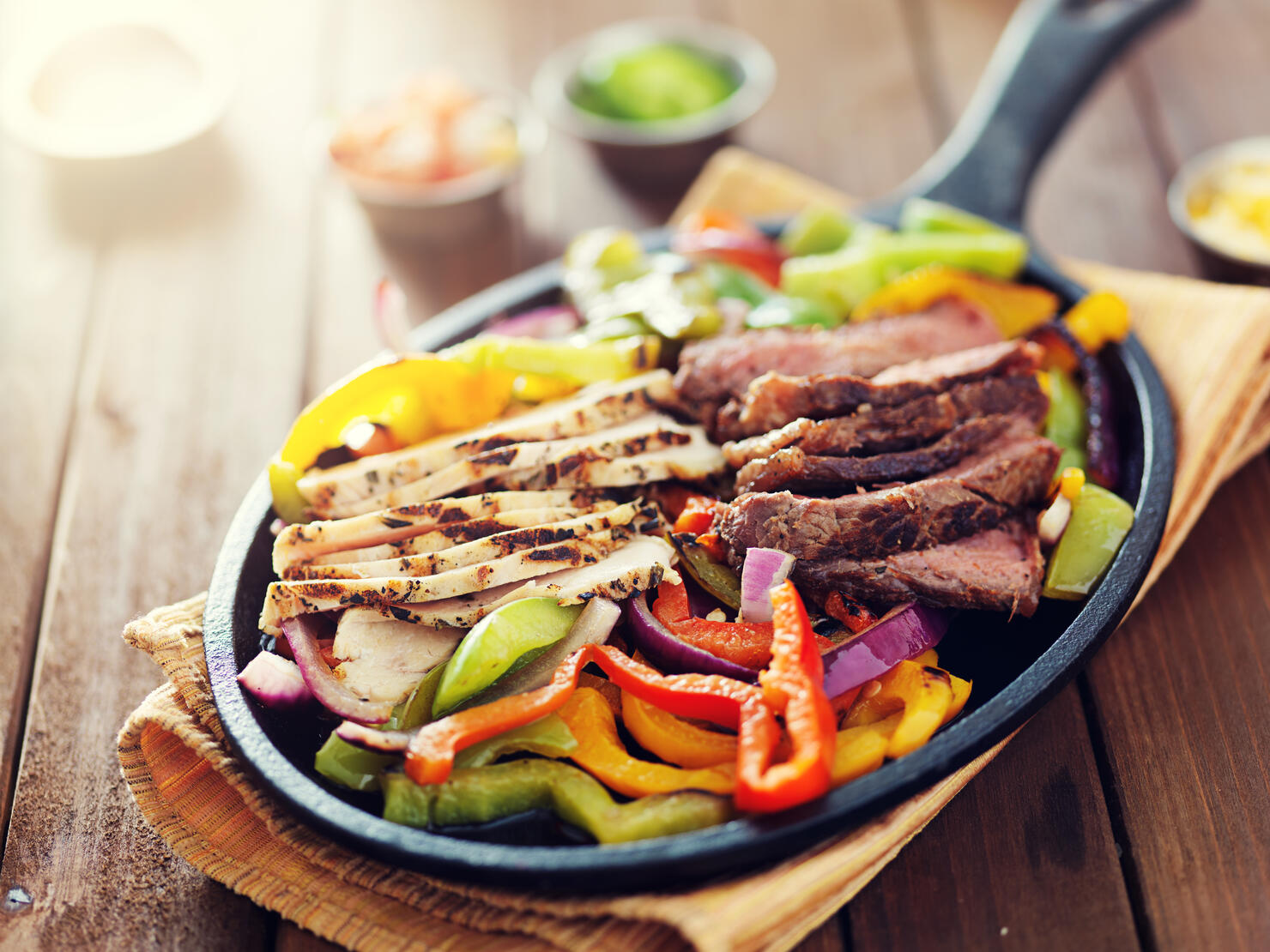 mexican food - skillet fajitas with steak and chicken