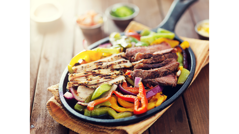 mexican food - skillet fajitas with steak and chicken