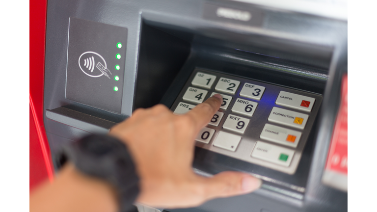 Selective focus of Hand and Keyboard on the ATM