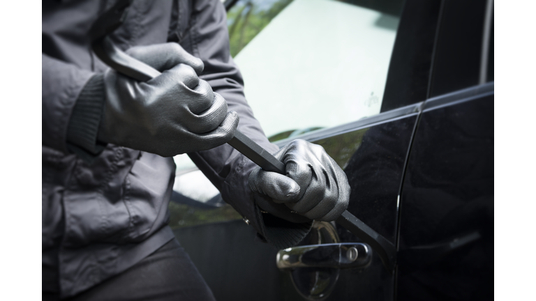 Germany, North Rhine Westphalia, Burglary breaking into car