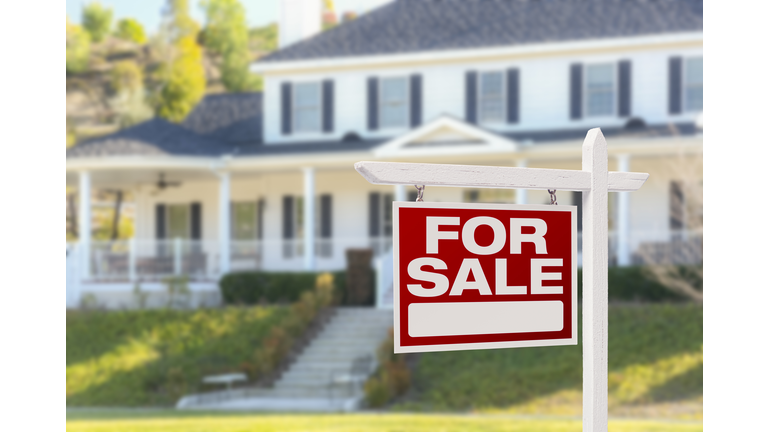 Home For Sale Sign in Front of New House