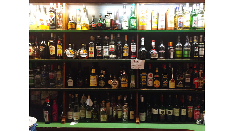 Bottles Arranged In Liquor Store