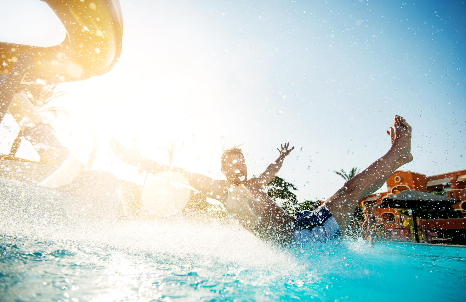 Man having fun on water slide.