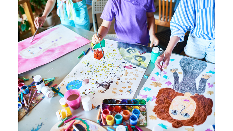 Hands of Children Painting in Art Class