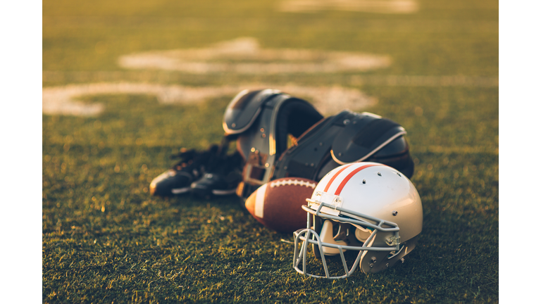 Silver Football Helmet on Field
