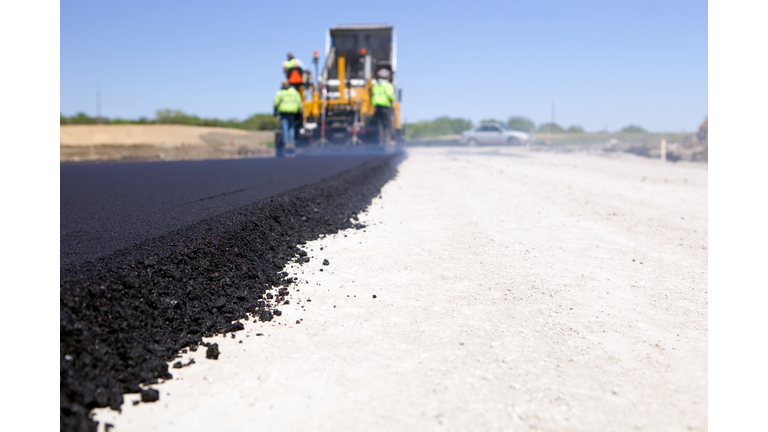 Blacktop Paving Road with Paver and Dump Truck