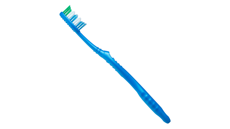 Blue toothbrush on a white background