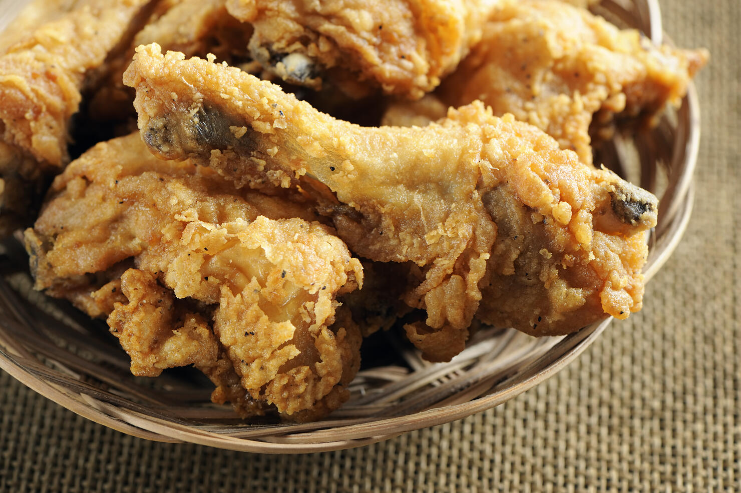 Close-up of a plate filled with fried chicken