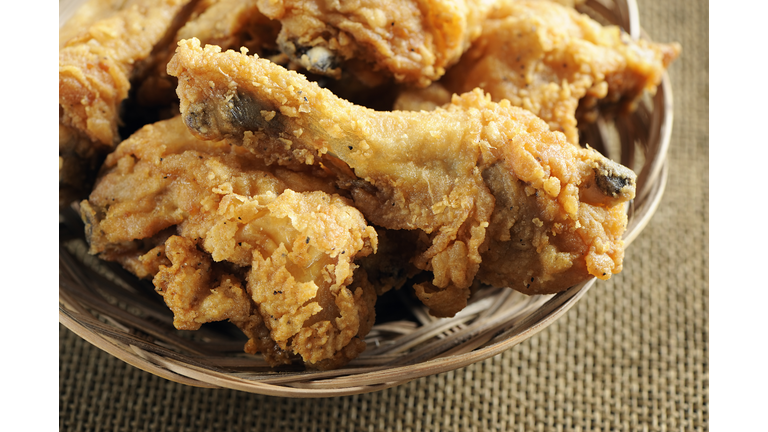 Close-up of a plate filled with fried chicken