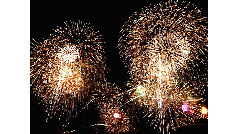 Low Angle View Of Firework Display At Night