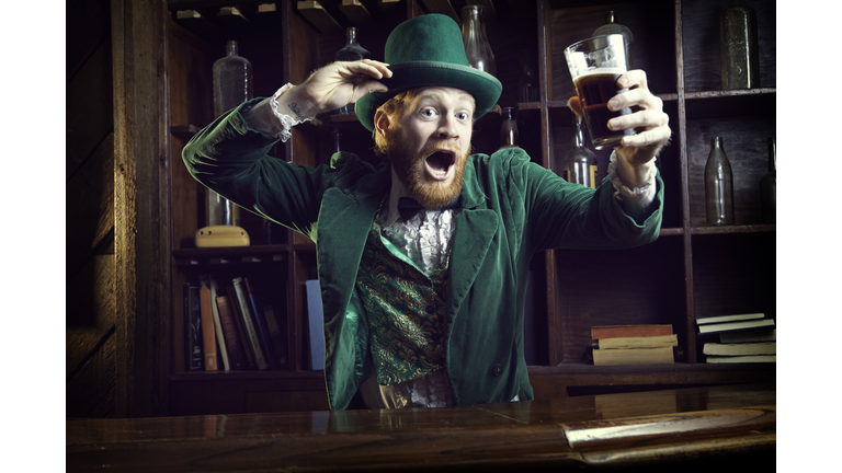 Irish Character / Leprechaun Celebrating with Pint of Beer