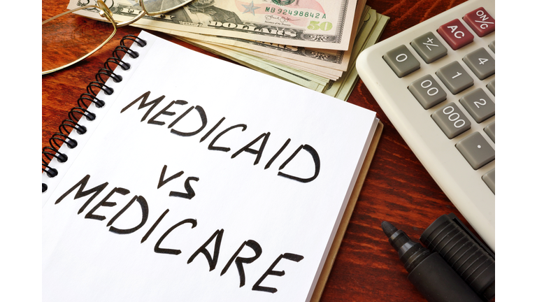 Medicaid vs Medicare written in a note. Health insurance concept.