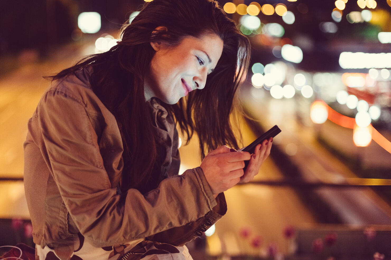 Girl in the city by night