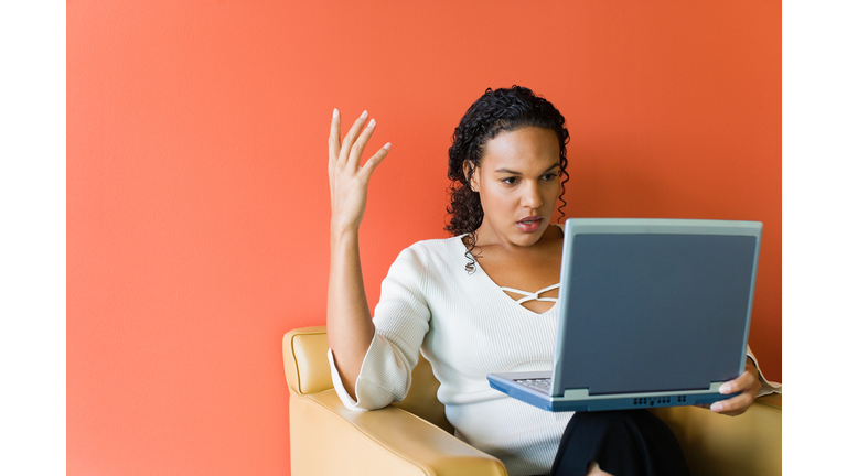 Frustrated businesswoman with laptop computer