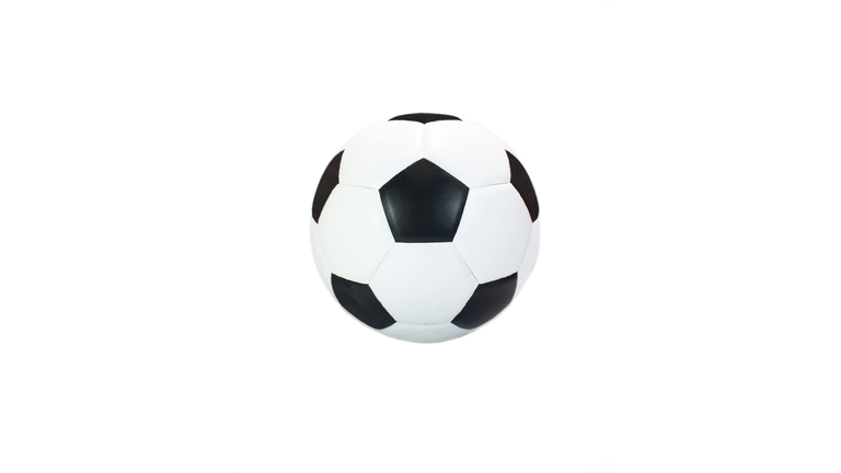 Close-Up Of Soccer Ball Against White Background