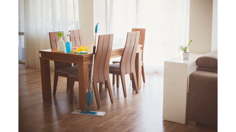 House cleaning supplies in dining room