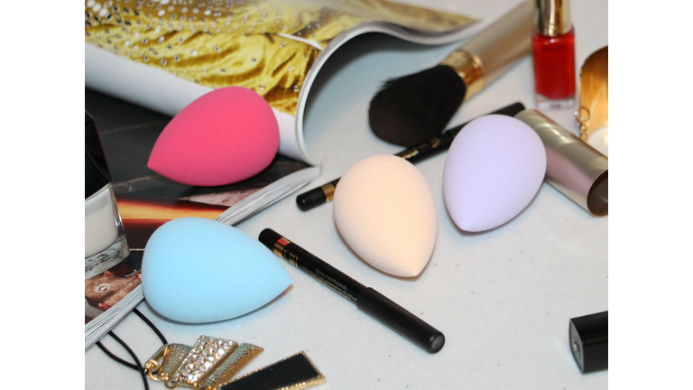 Cosmetic sponge for applying cosmetics on the face. Pink color.