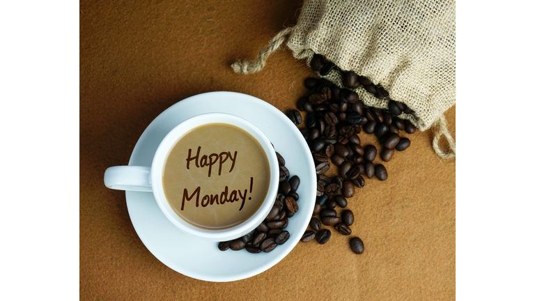 Digital Composite Image Of Happy Monday Text On Coffee At Table