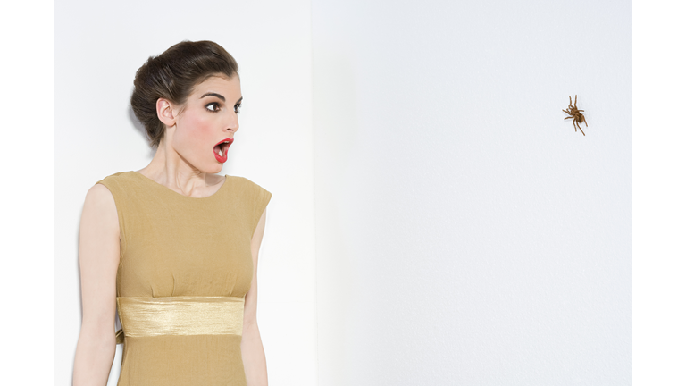 Woman afraid of spider