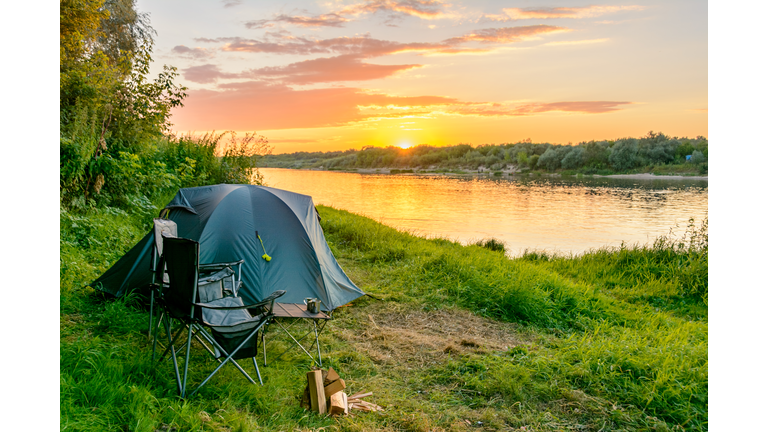 Camping tent in a camping in a forest by the river