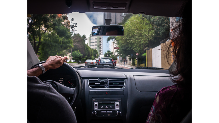 Couple Traveling In Car