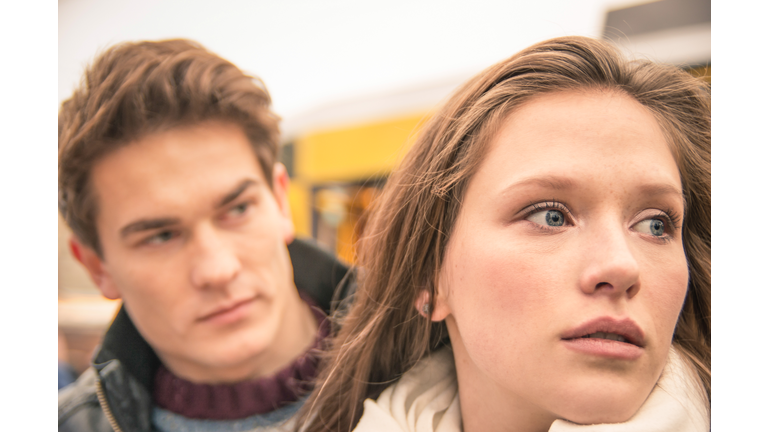 Couple during break up - Sad young woman