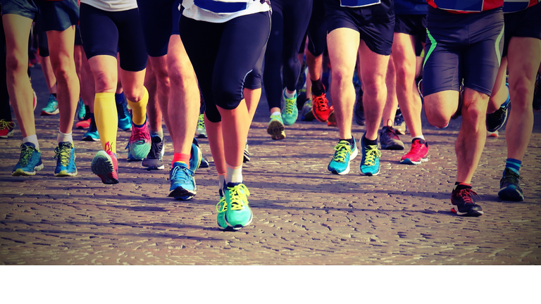 Athletes Running On Road