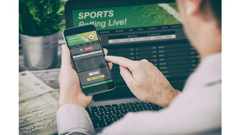 betting bet sport phone gamble laptop concept