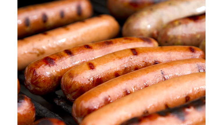 Close up of grilled hotdogs on grill